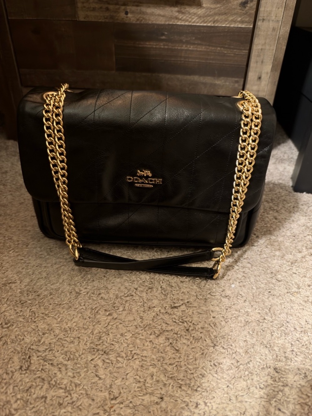 Coach Elodie Black Quilted Shoulder Bag with Gold Chain Straps